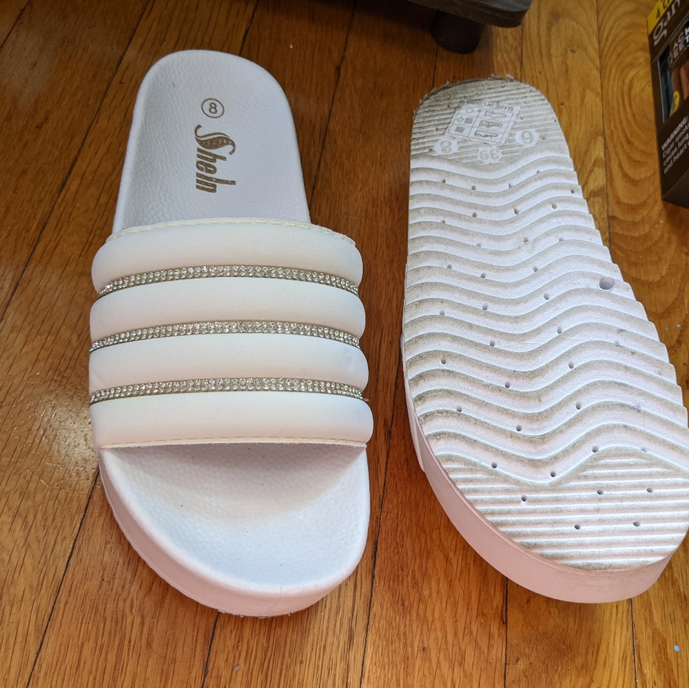 Tall white sandals